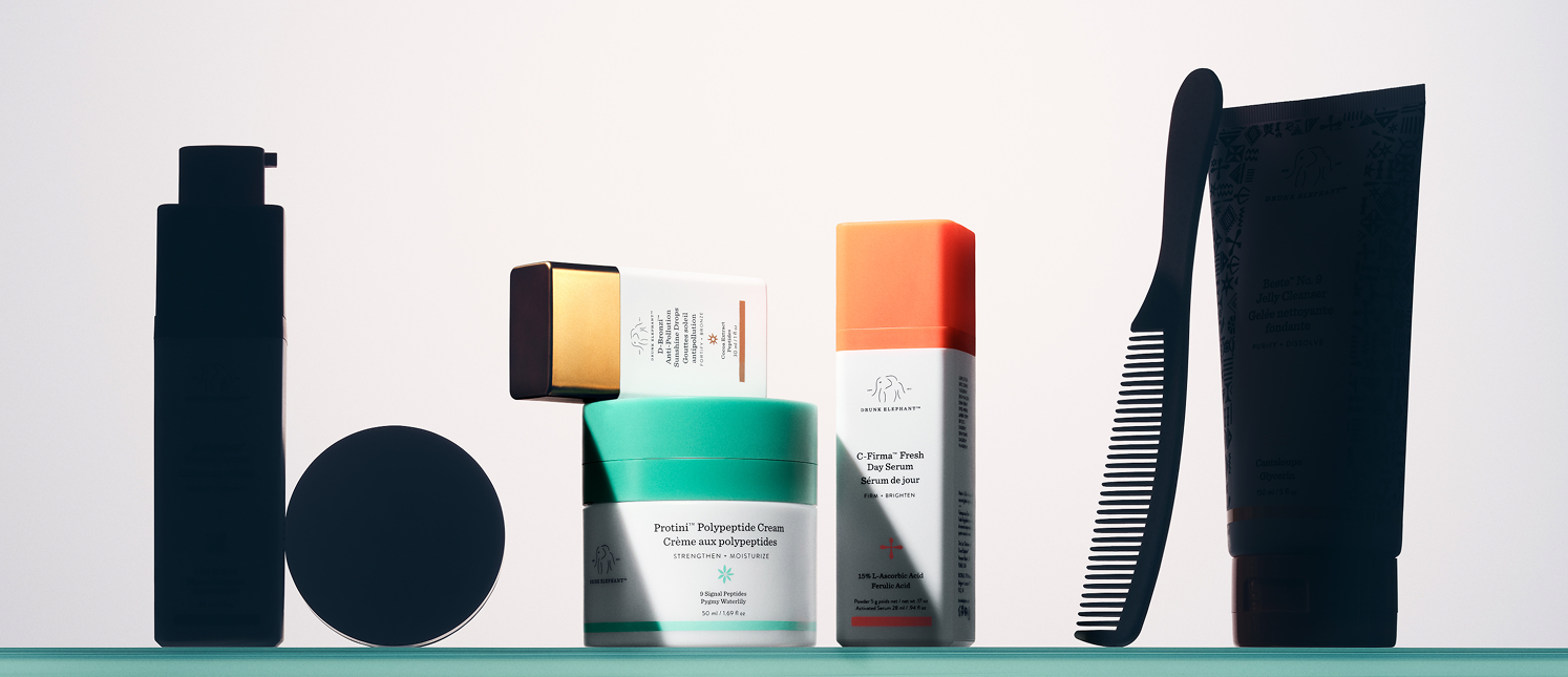 Model applying face cream 